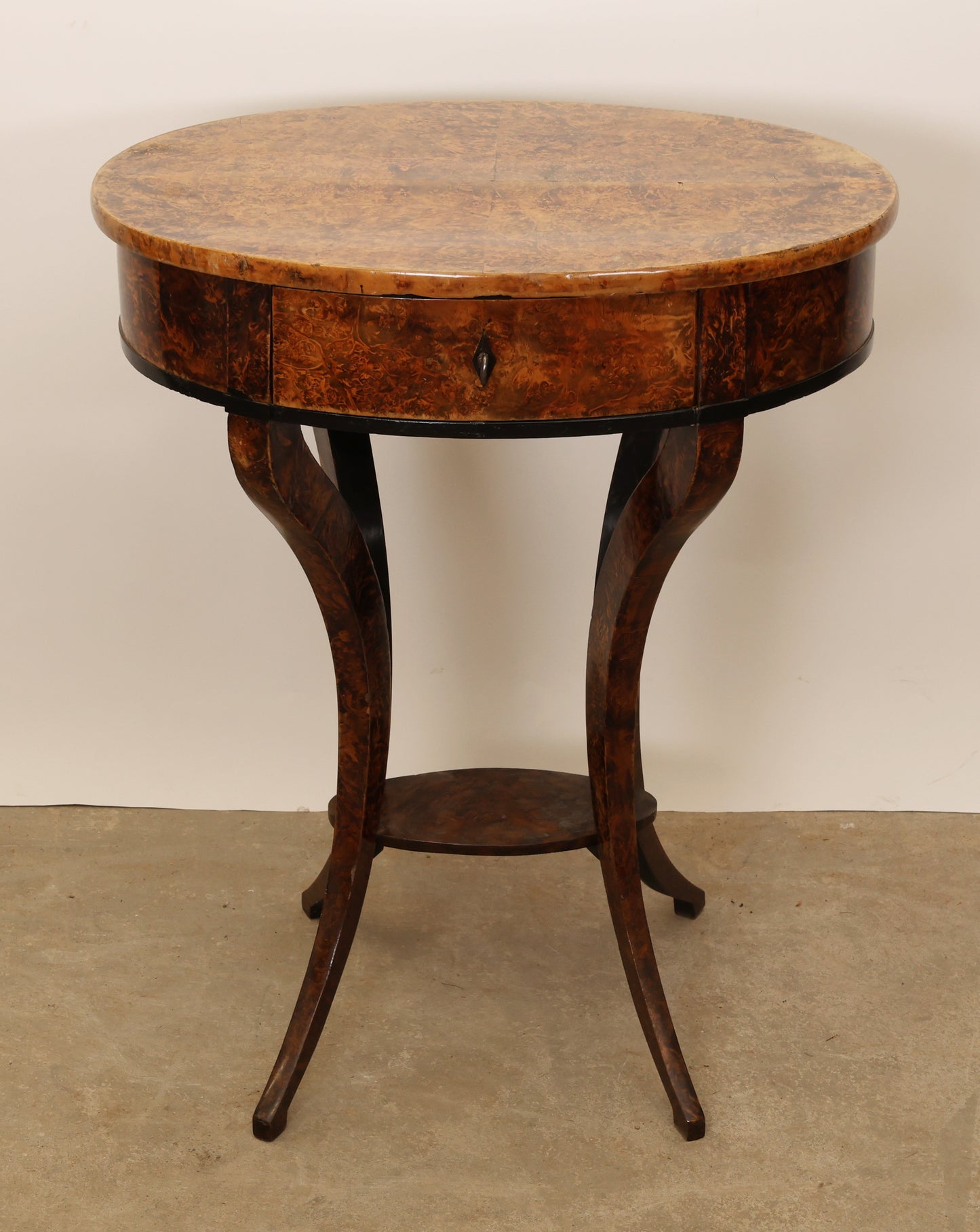 An 1800´s antique table veneered in root for sale.