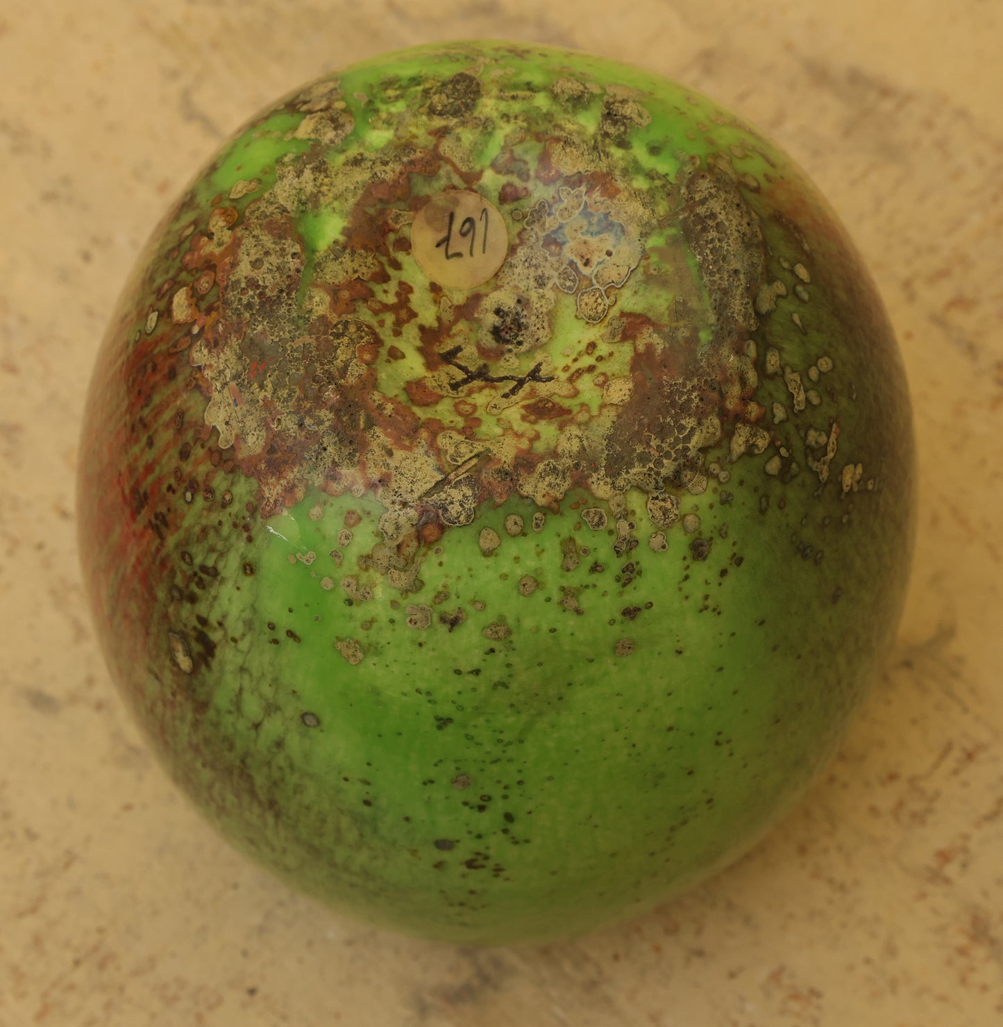Green apple in high-fired faience by Hans Hedberg underneath