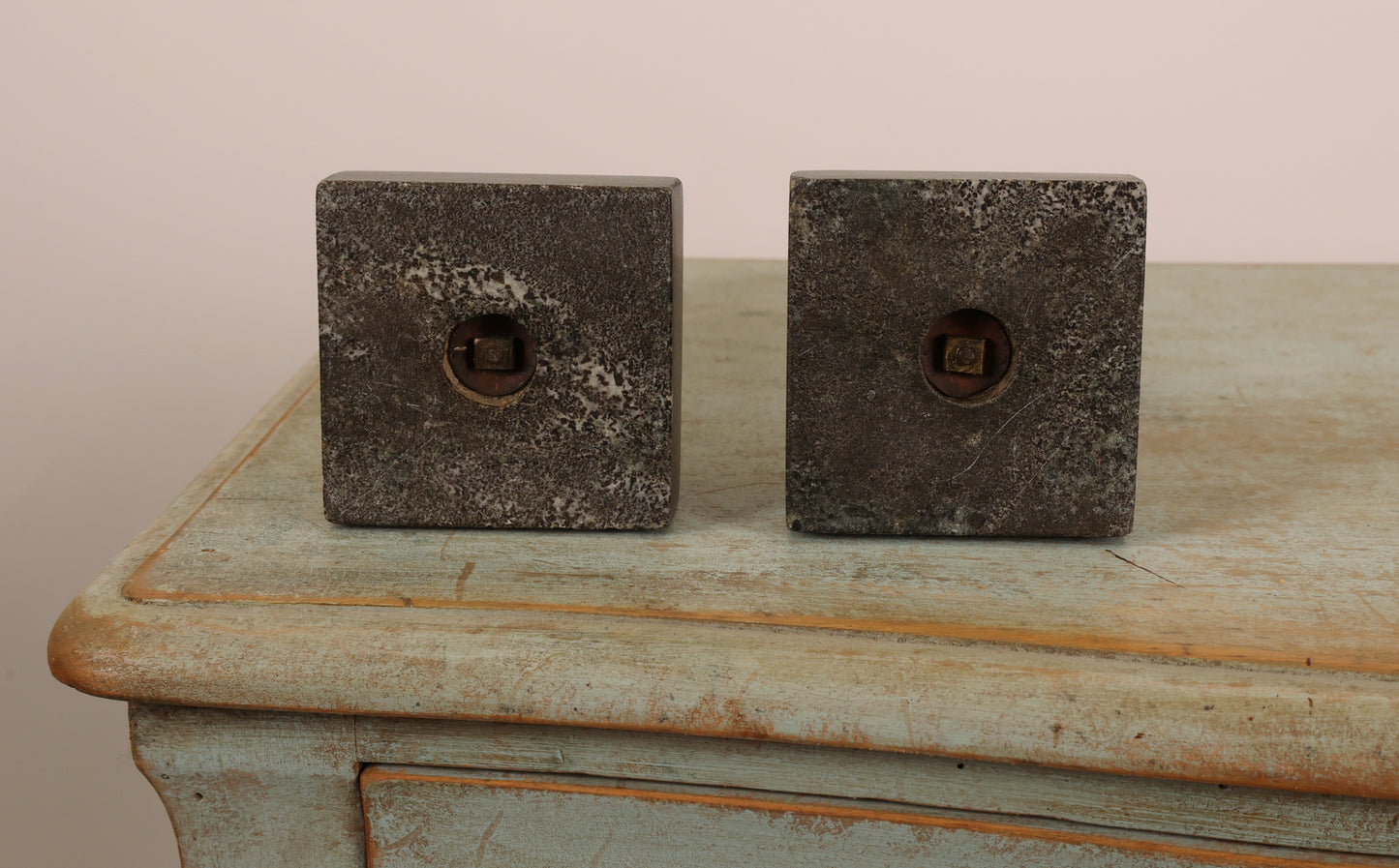 Underneath a pair of Kolmården marble candlesticks from the 19th century.