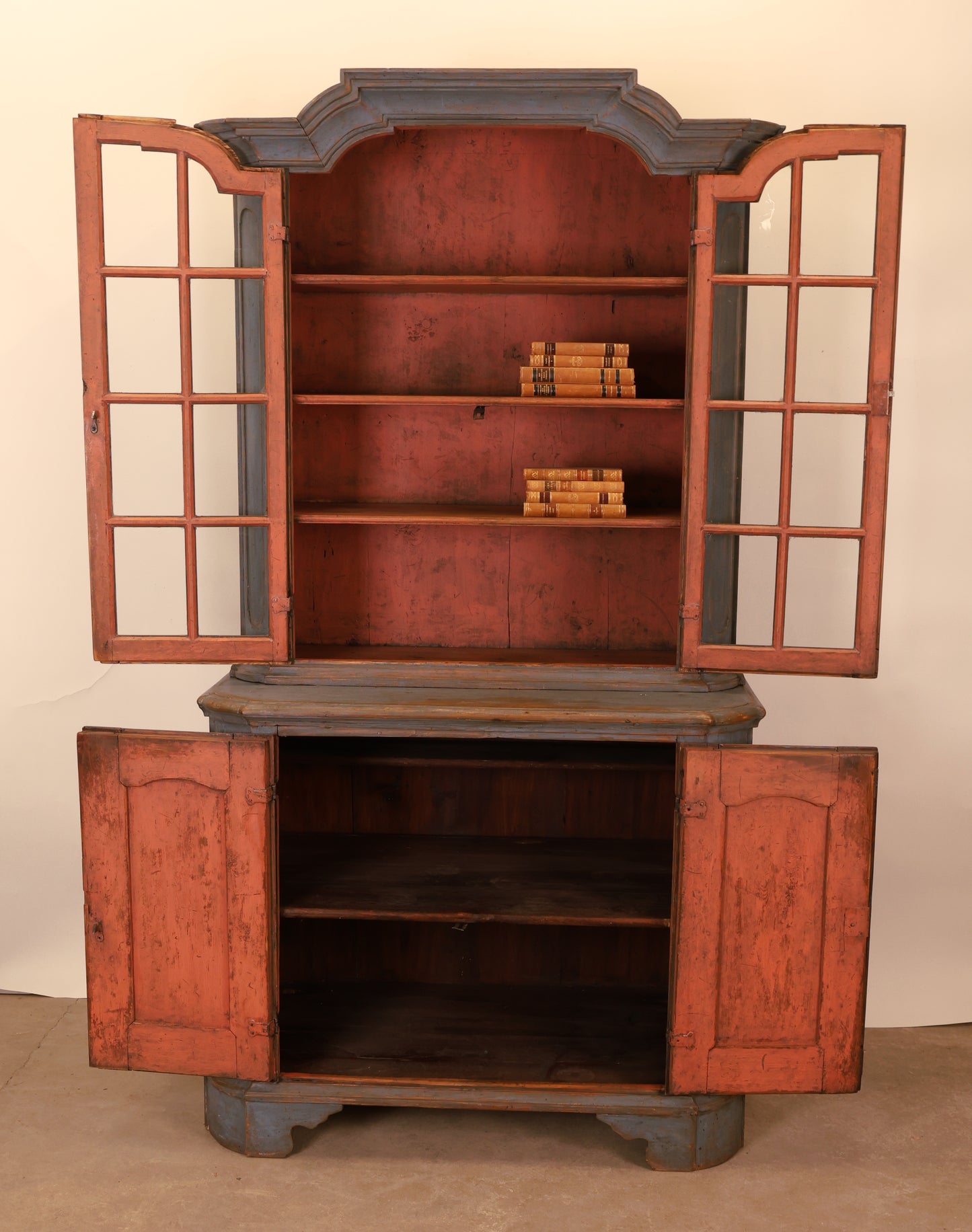 An opened Rococo display cabinet.