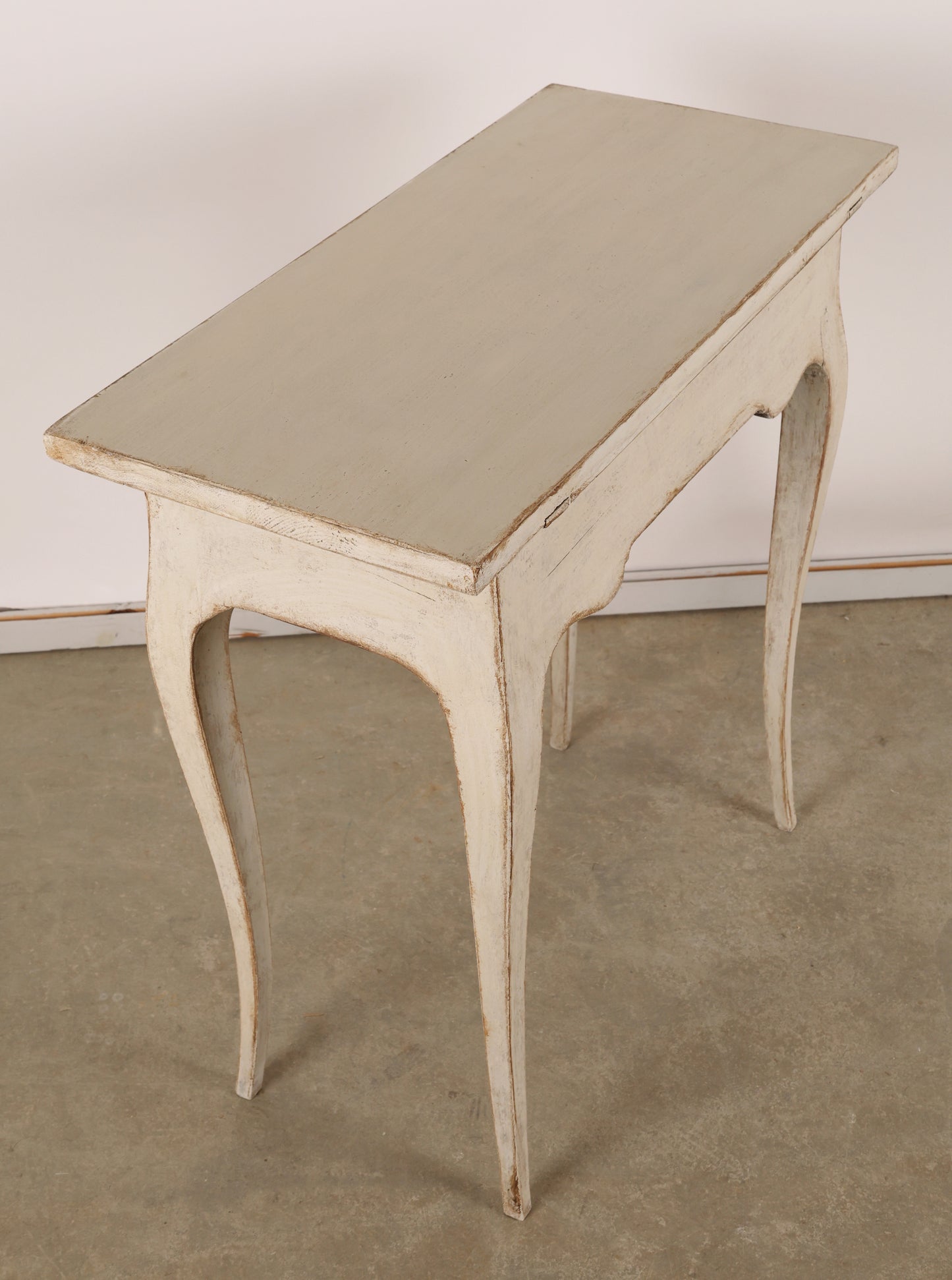 Side and back view of 18th Century Rococo Table in grey color