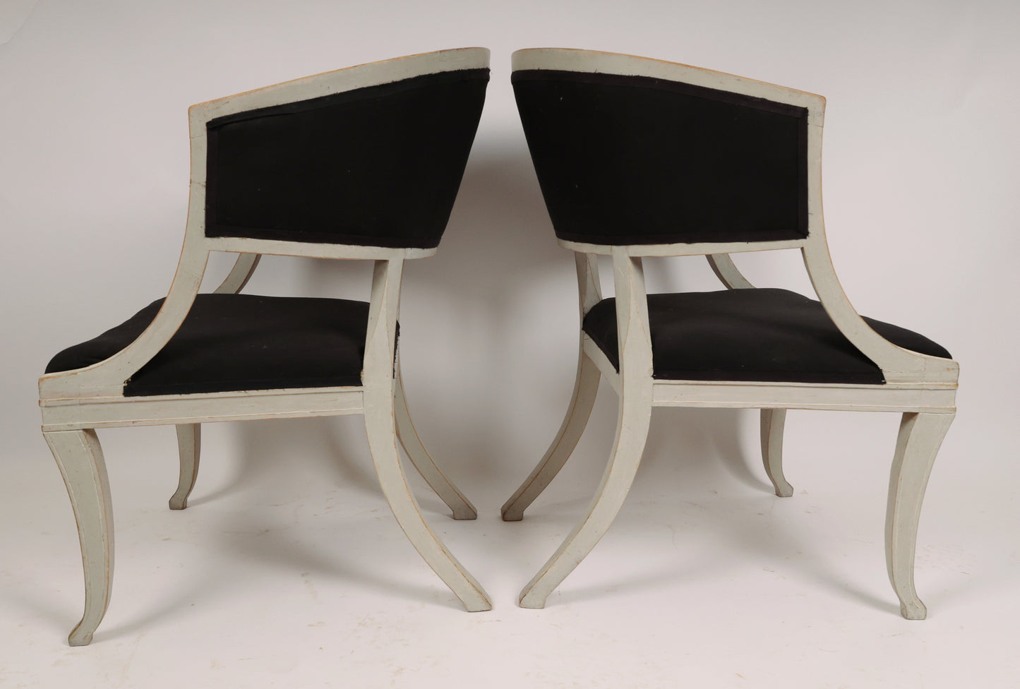 Pair of Early 19th Century Empire Armchairs with their backs against each other