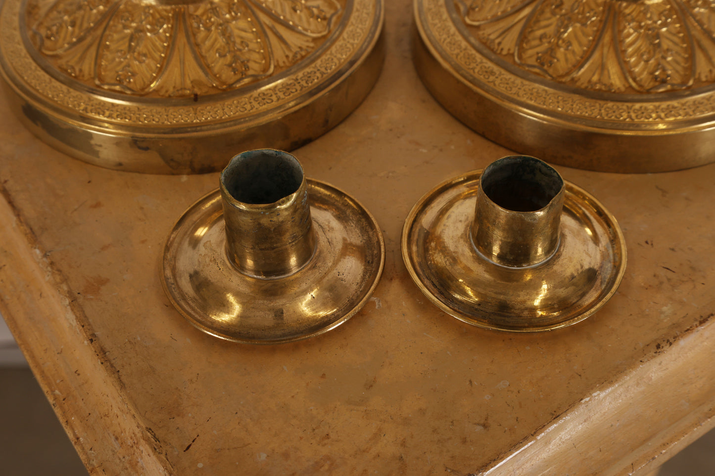 Detached parts of empire candleholders