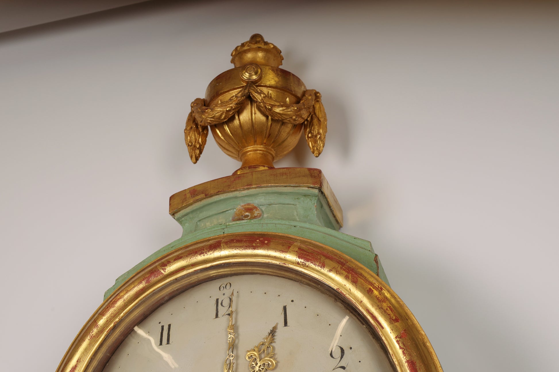 Close up of gilded urn detail of 18th Century Gustavian Longcase Clock