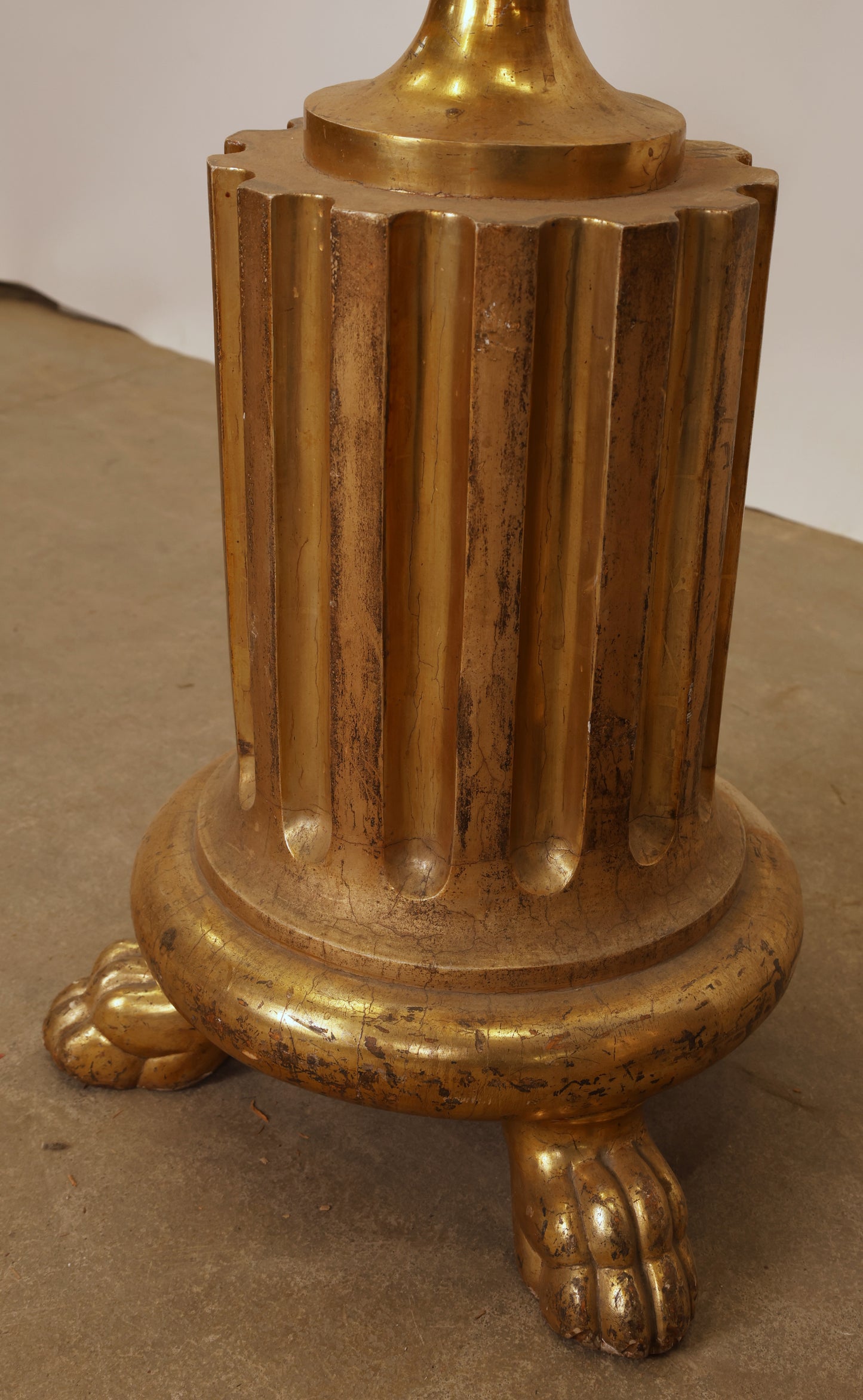 The base of an antique guéridon.