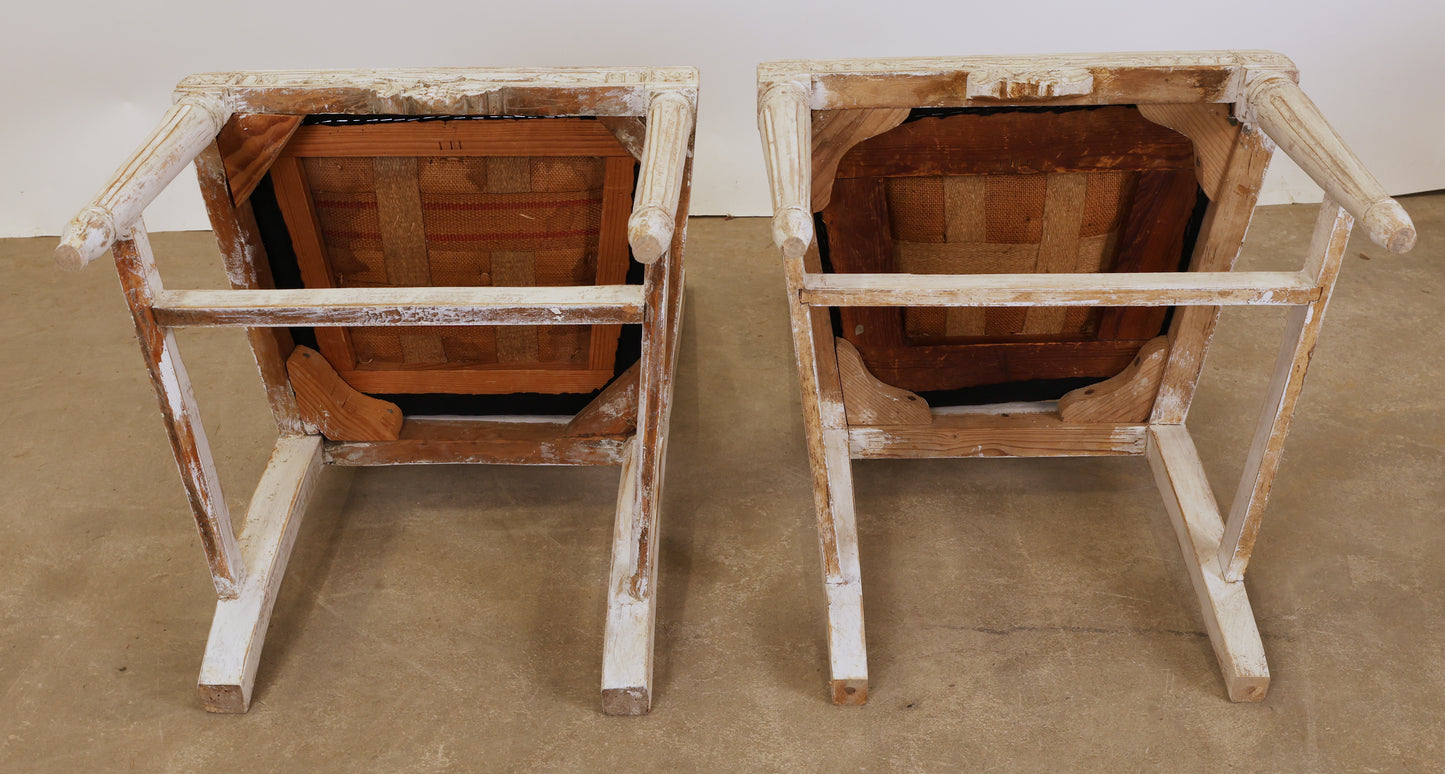 Gustavian chairs underneath.