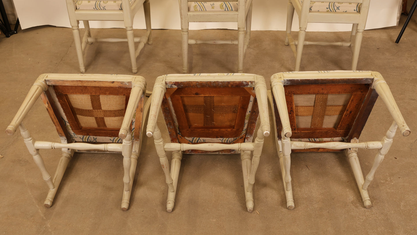 Photo of Gustavian chairs underneath.