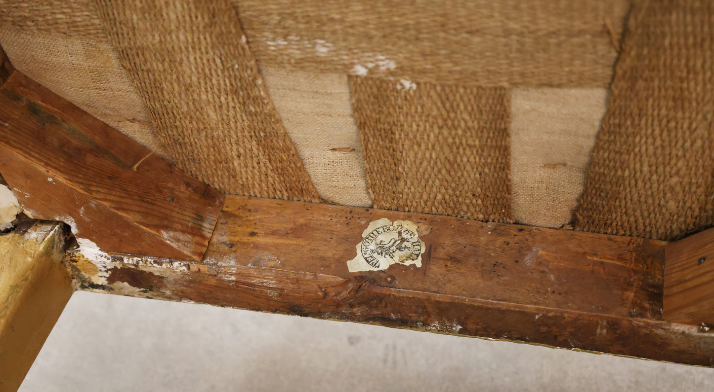 Stamp on an antique tub chair.