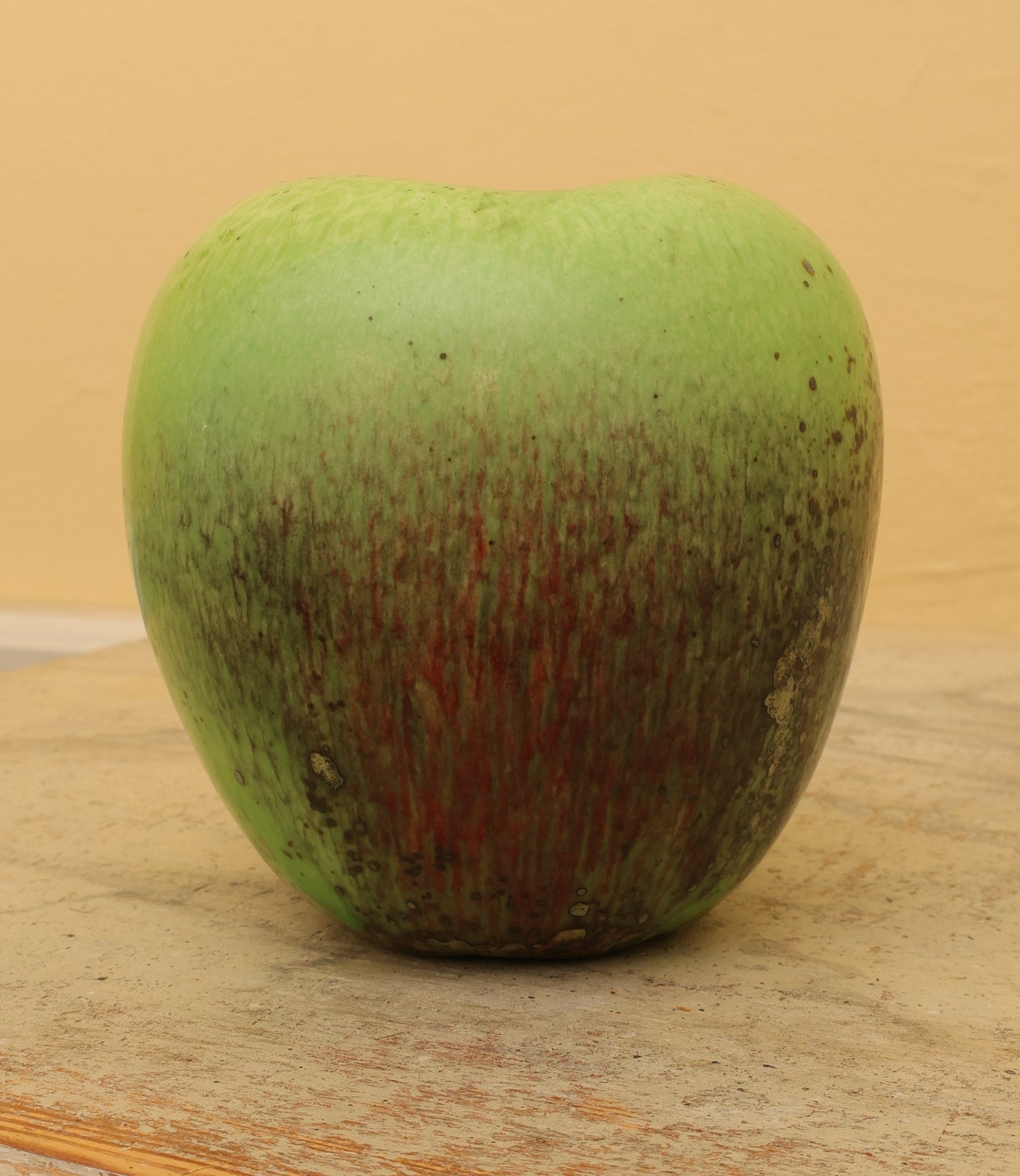 Green apple in high-fired faience by Hans Hedberg