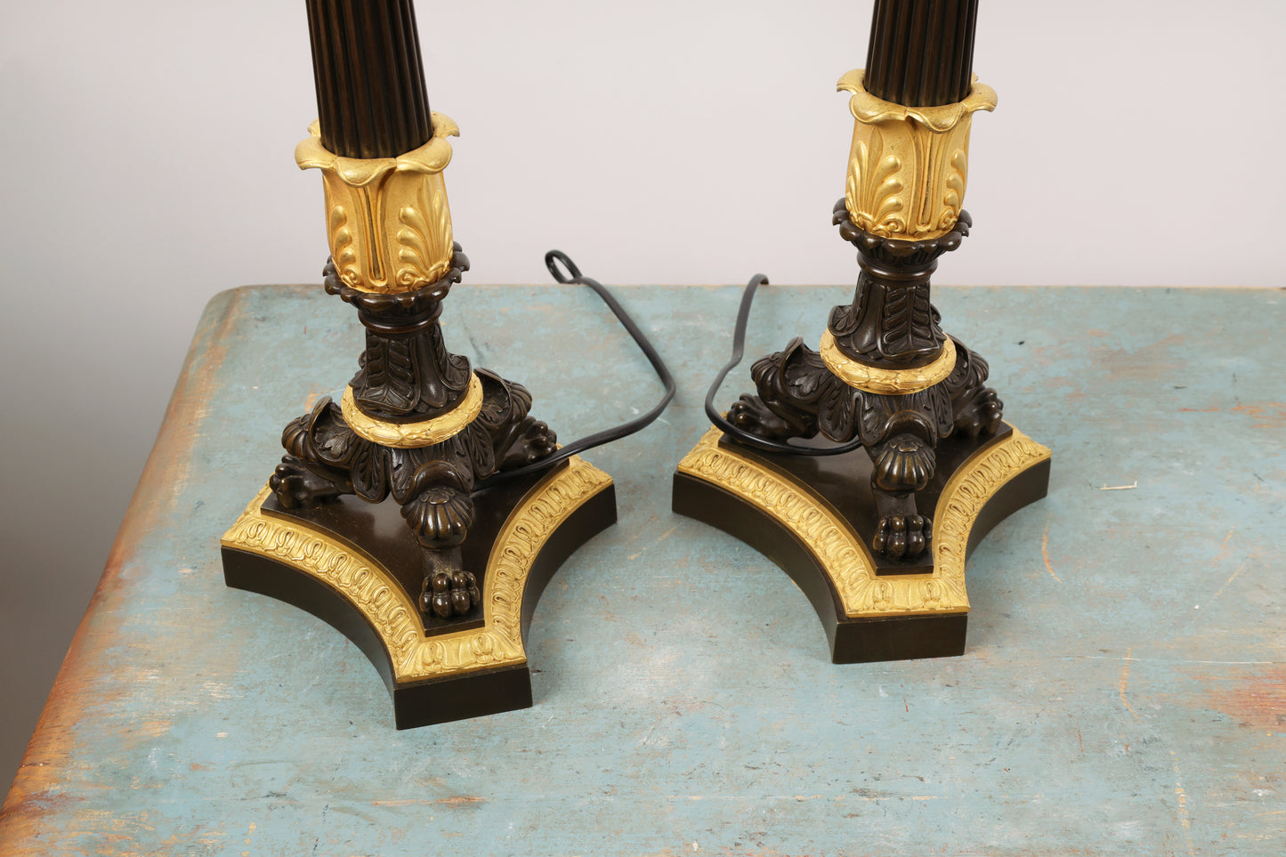 A pair of french antique lamp bases for sale.