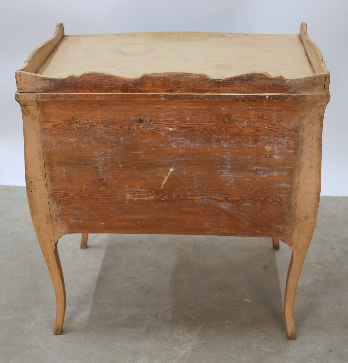 Back view of a Rococo nightstand