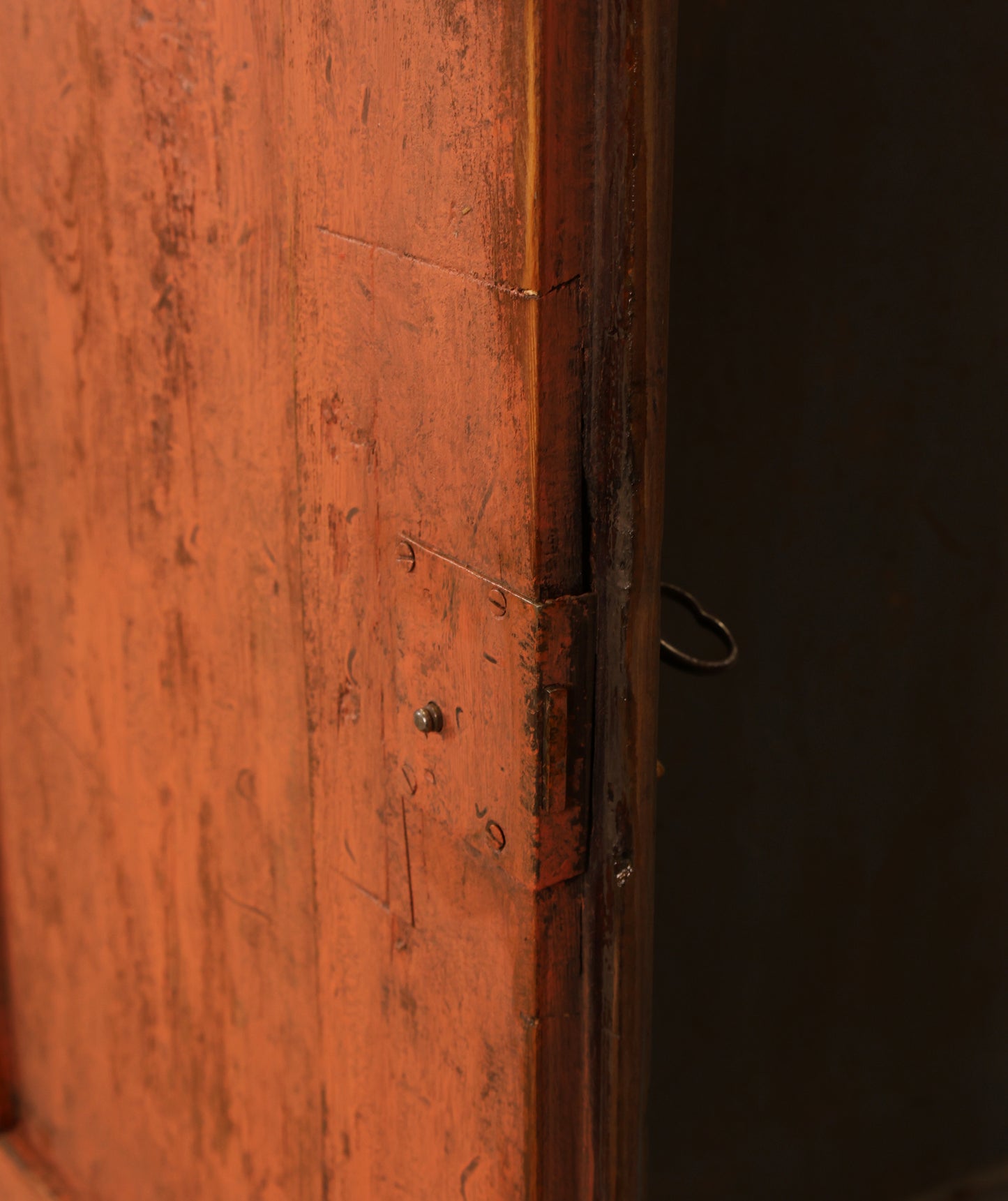 A detail on the door of a Rococo cabinet.