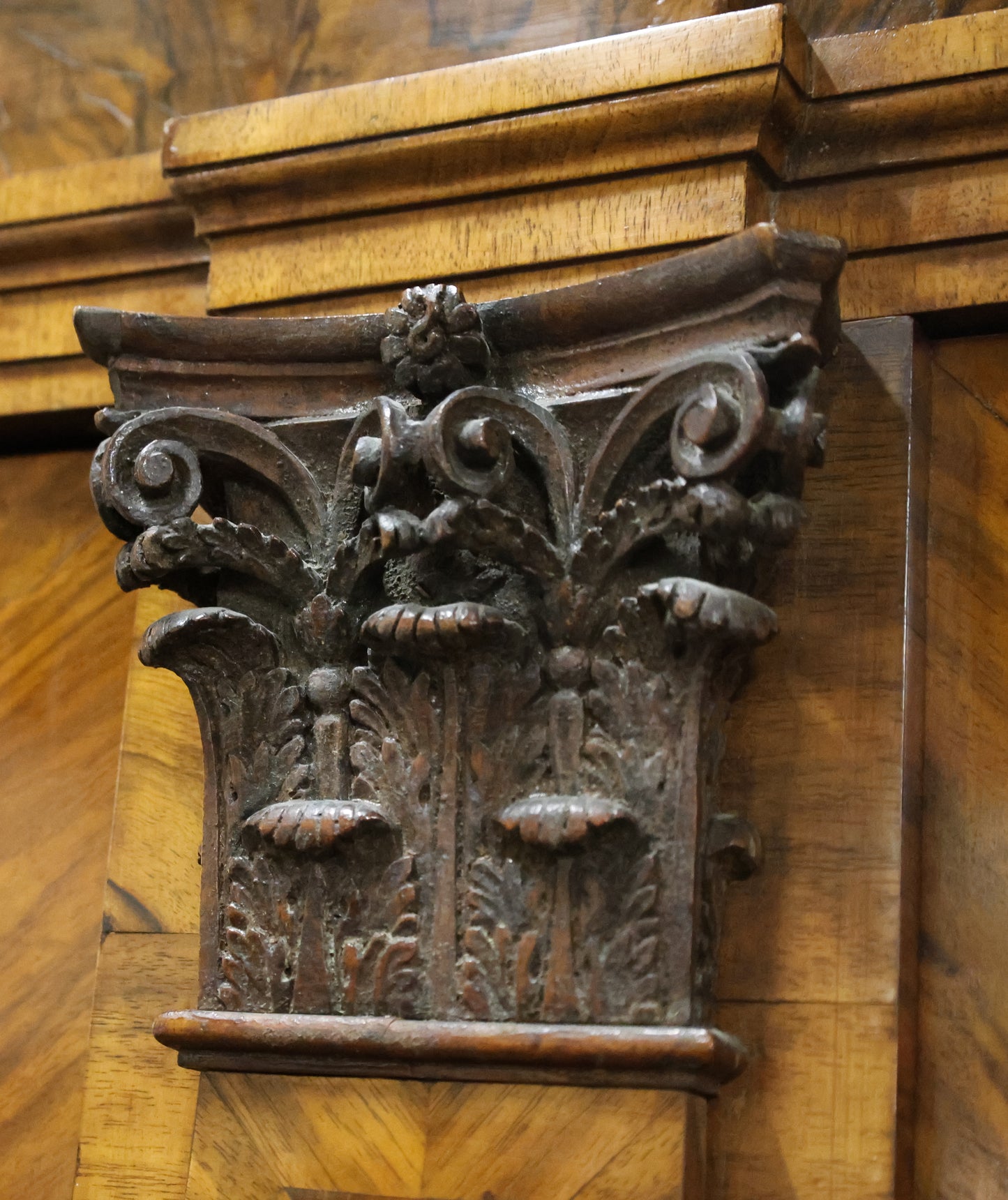 Detail on a rococo masterpiece cabinet for sale.
