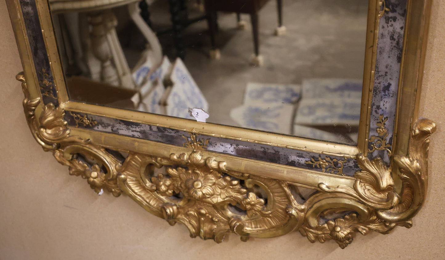 Details of a beautiful gilded rococo mirror from the 18th century.