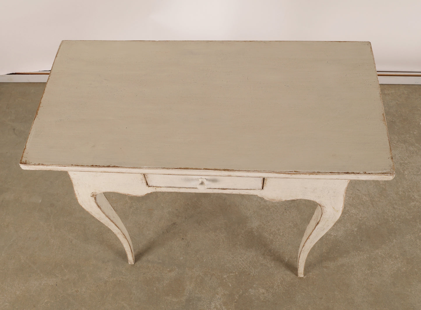 View from above of an 18th Century Rococo Table in grey color
