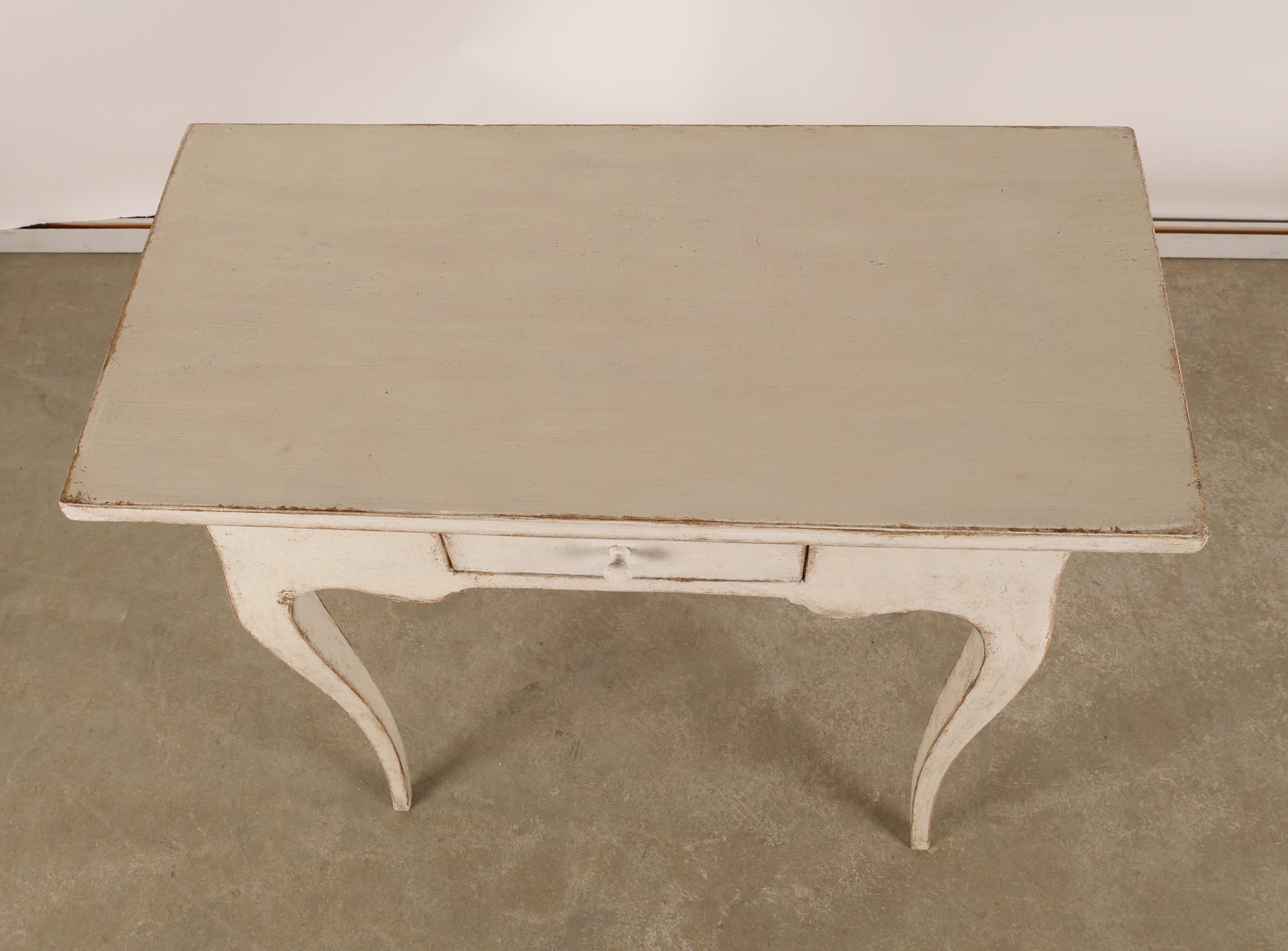 View from above of an 18th Century Rococo Table in grey color