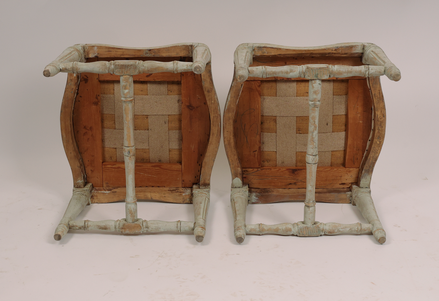 Underneath a pair of gustavian stools for sale
