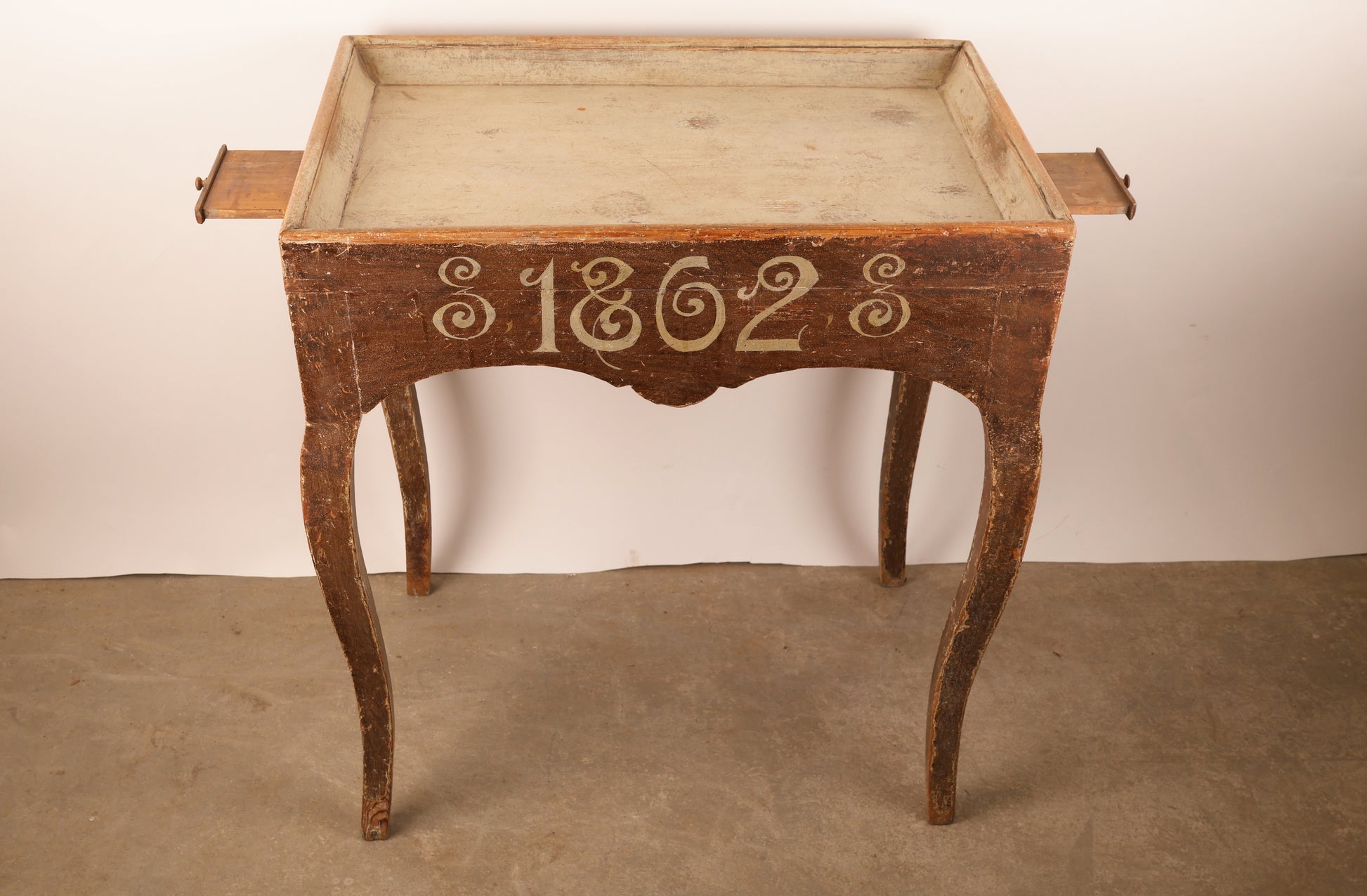 An 18th Century Rococo Antique Tray Table with pull out surfaces for candles.