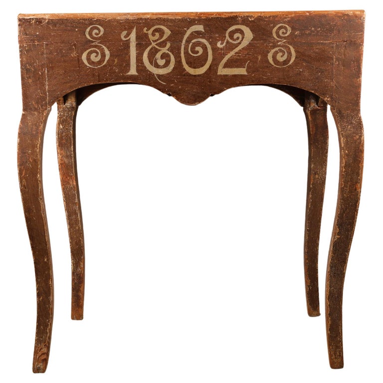 A tray table from Mälardalen, 1760. The table has been repainted 1862.