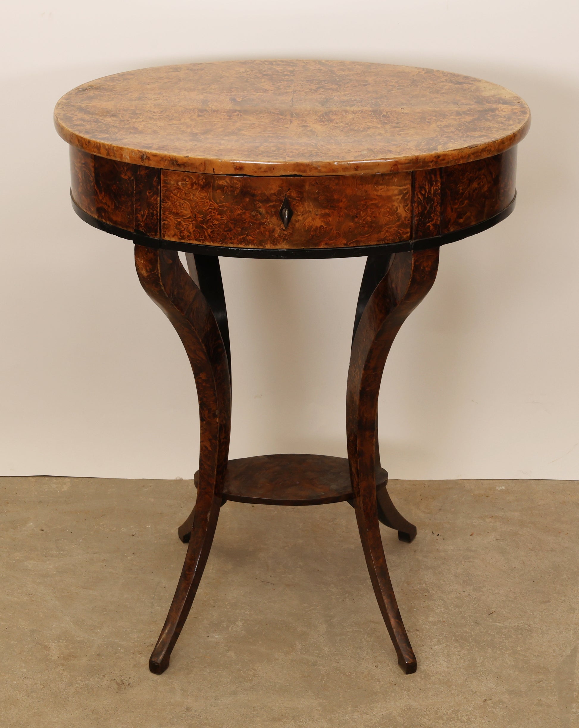 An 1800´s antique table veneered in root for sale.