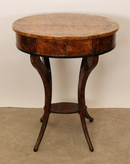 An 1800´s antique table veneered in root for sale.