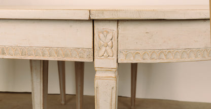 Close up of detail of 19th Century Gustavian Dining Table. Detail shows floral motif. 