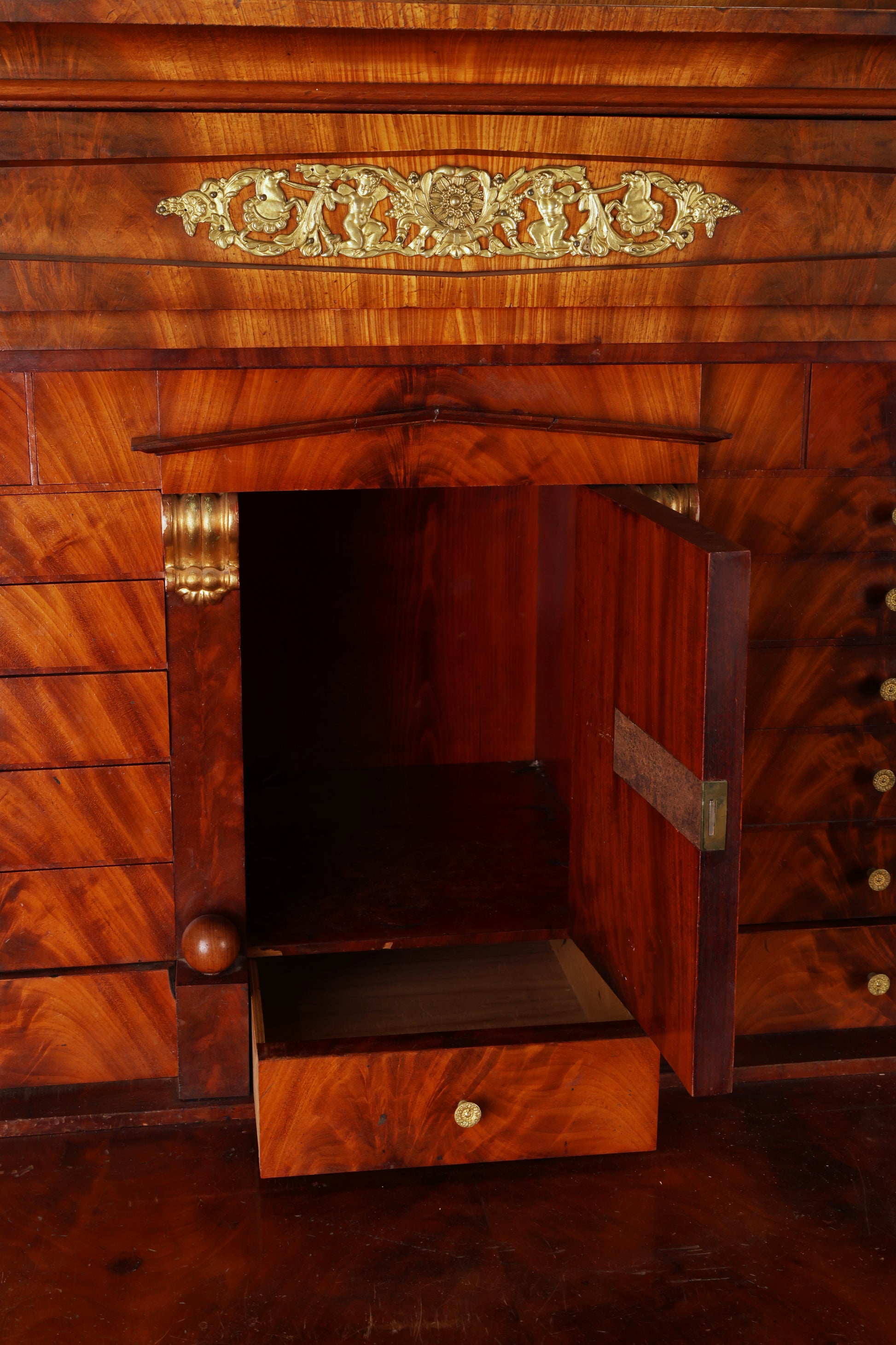Close-up of an antique secretary from the Empire epoch.