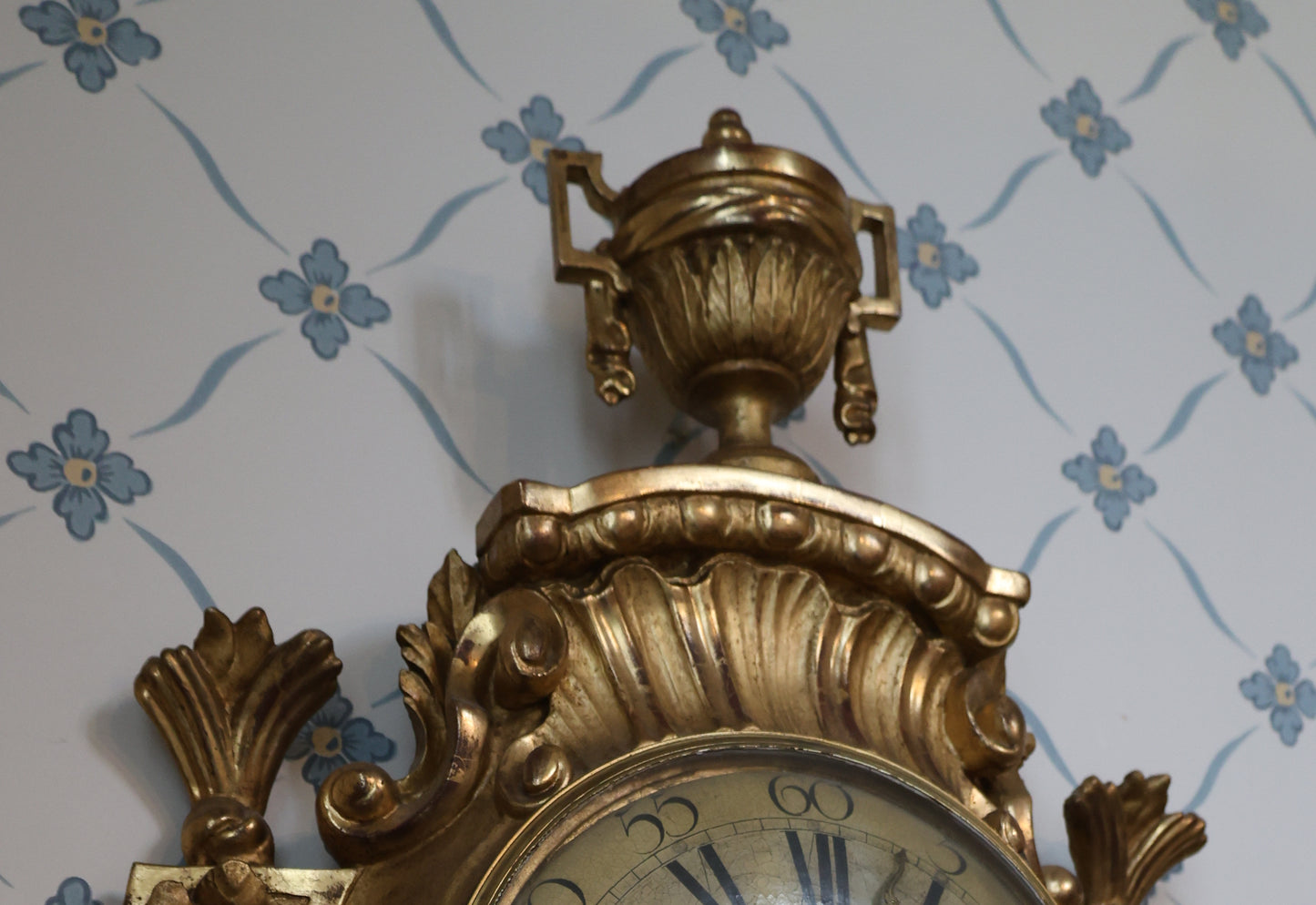 Close-up detail of a Chalice on a Wall Clock signed Jacob Kock from the transitional period between Rococo and Gustavian styles. Showing the top part