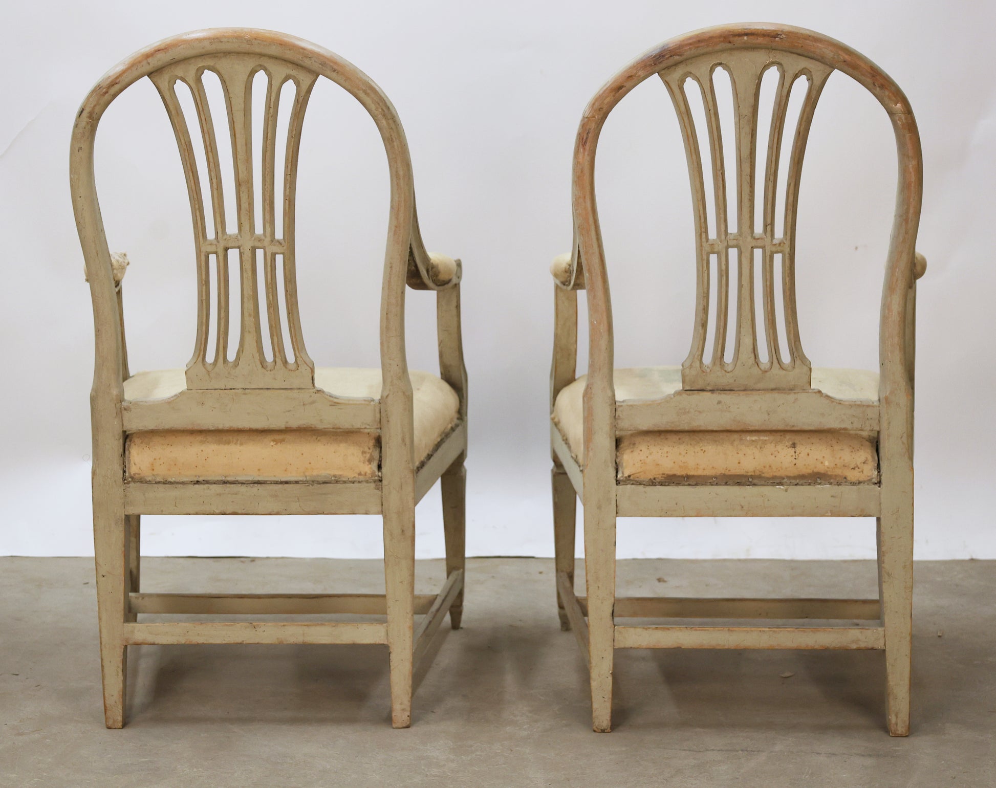 Antique Gustavian Armchairs viewed from the back.