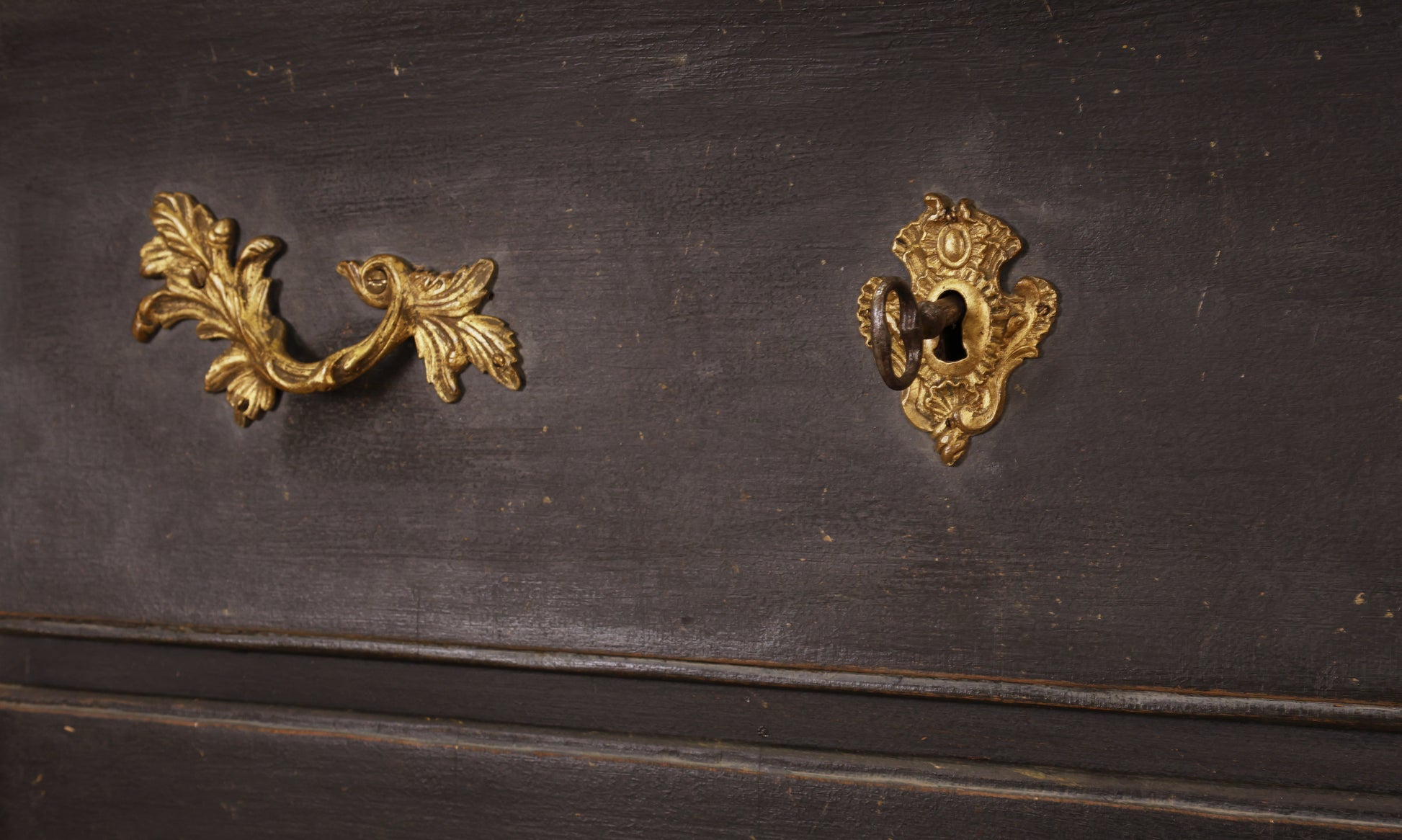 Details on a Rococo chest of drawers.