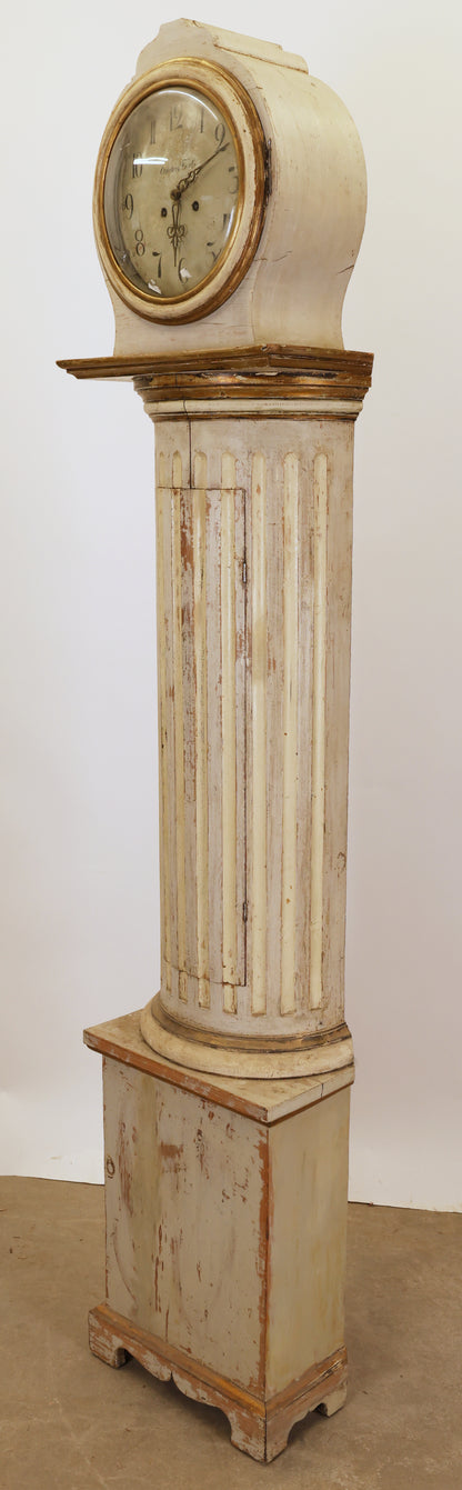 An antique column longcase clock.