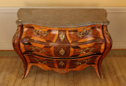 A Rococo jacaranda chest of drawers