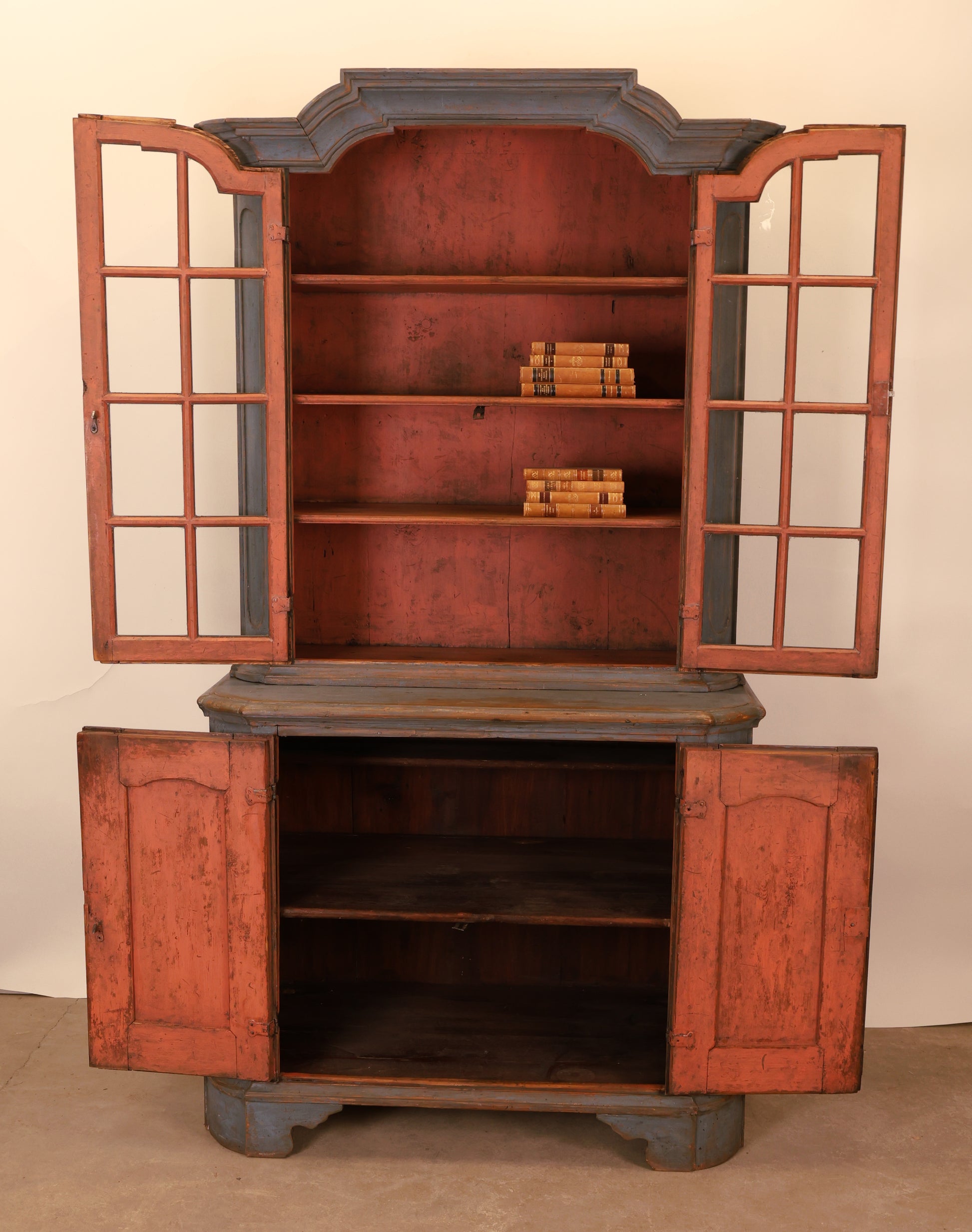An opened Rococo display cabinet.