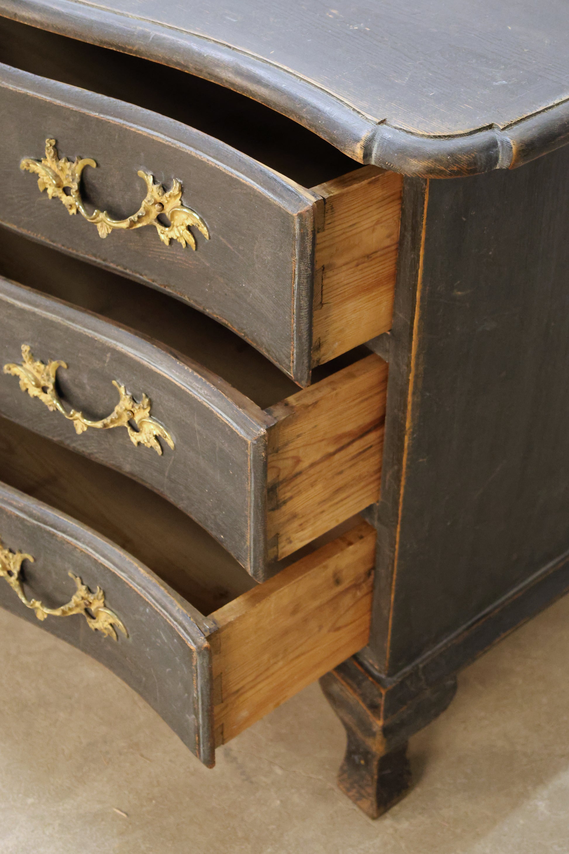 Black antique dresser from the Baroque period