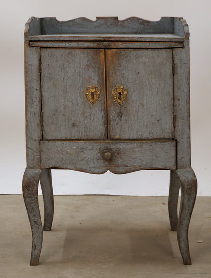 Antique nightsand from the Rococo epoch.