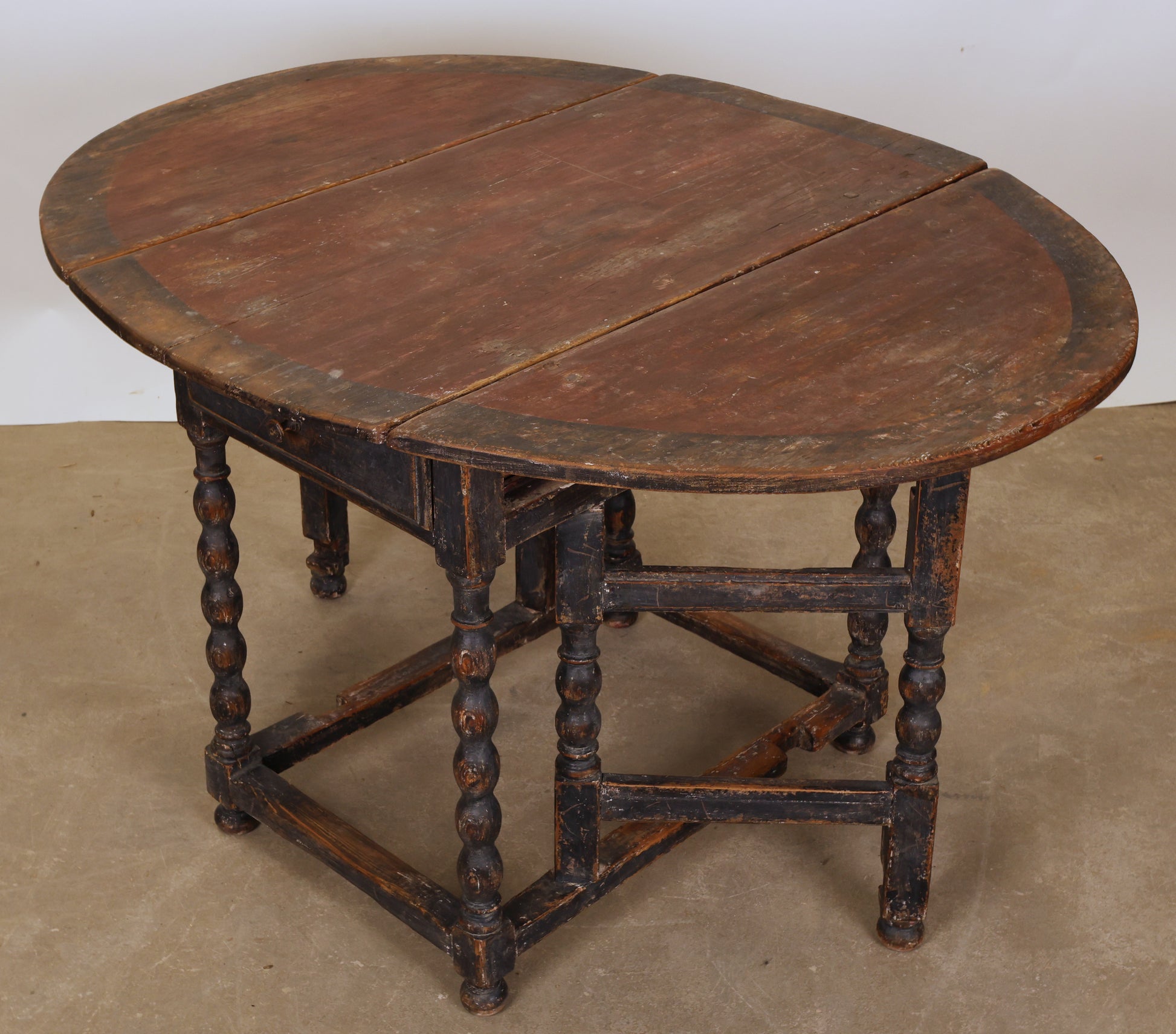 A Baroque gateleg table.