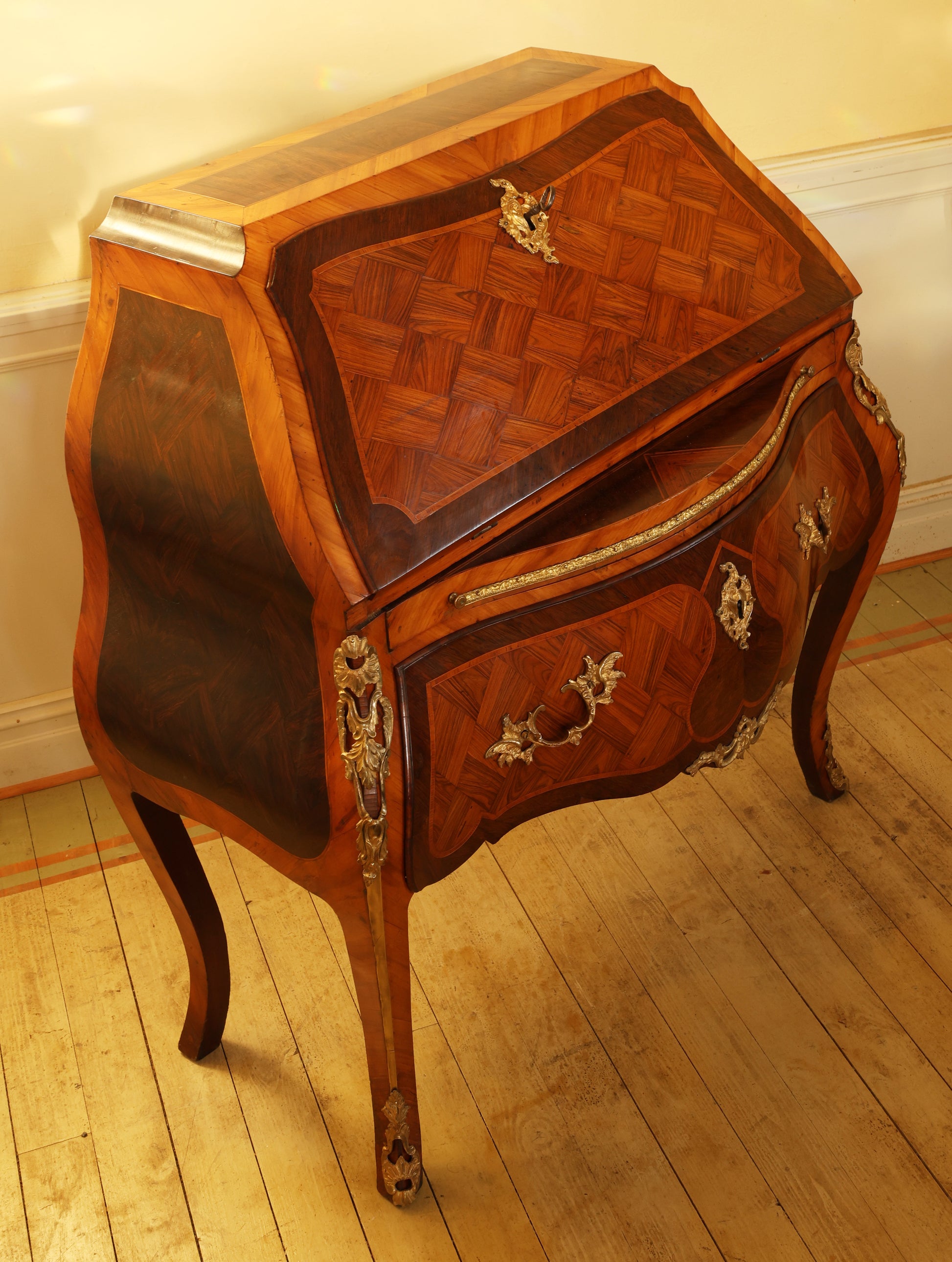 An antique secretary in Rococo.