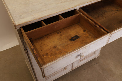 Drawers on an antique Swedish sideboard from the Gustavian epoch.