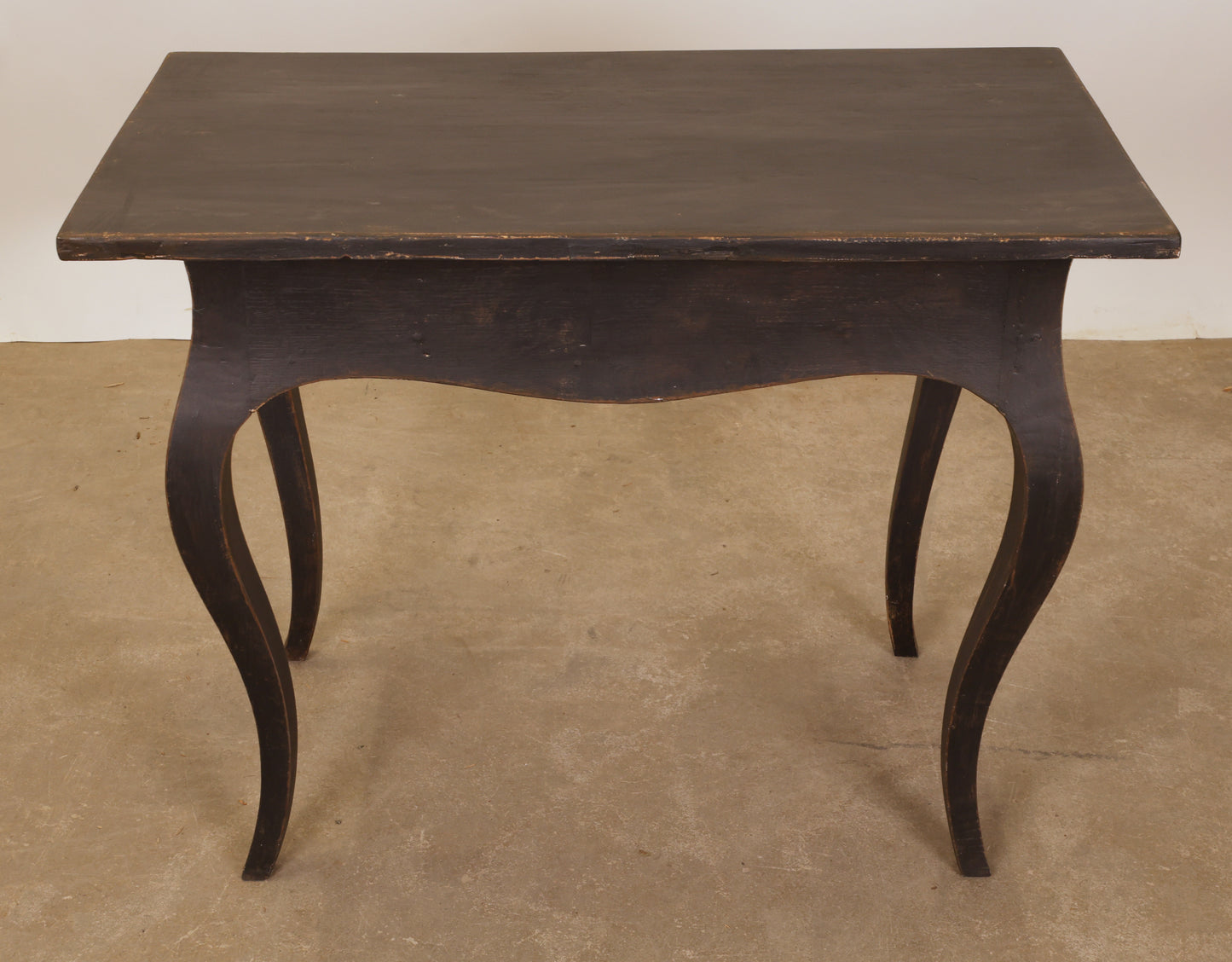 The back of a Rococo table.