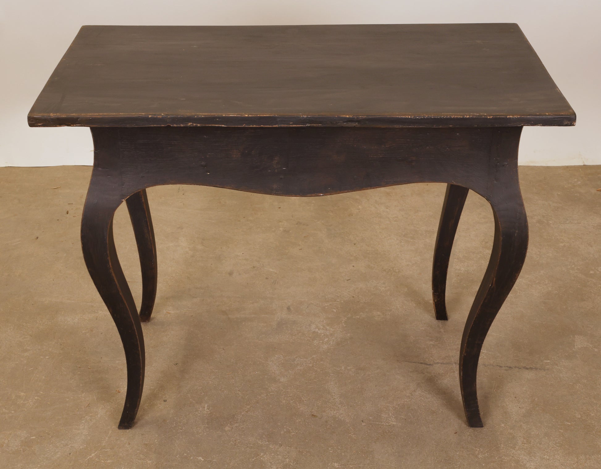 The back of a Rococo table.