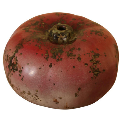 Red high-fired faience pumpkin by Hans Hedberg with white background