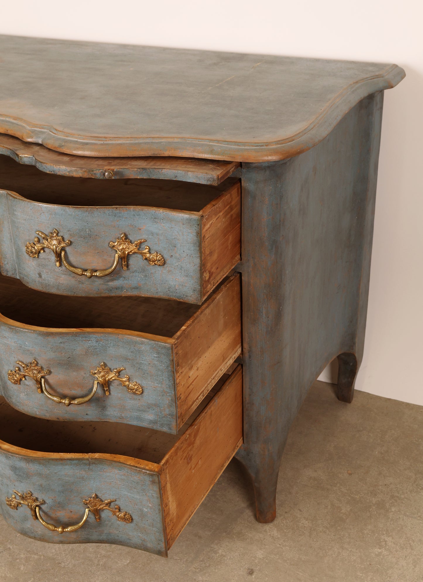 Close up view of opened drawers of an 1750s Baroque Commode 