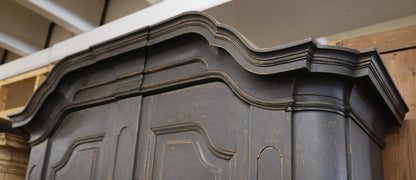 Close up of a black Antique cabinet
