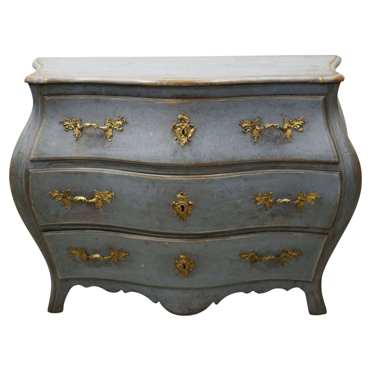A blue chest of drawers made during the Rococo period.