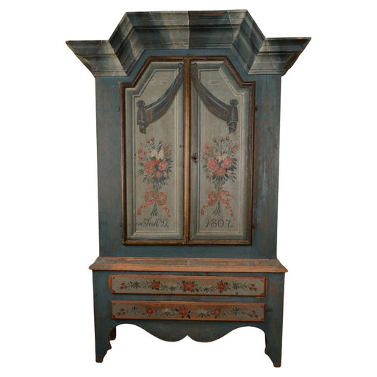 Early 19th Century Cabinet in a beautiful blue color and flowers. White background.