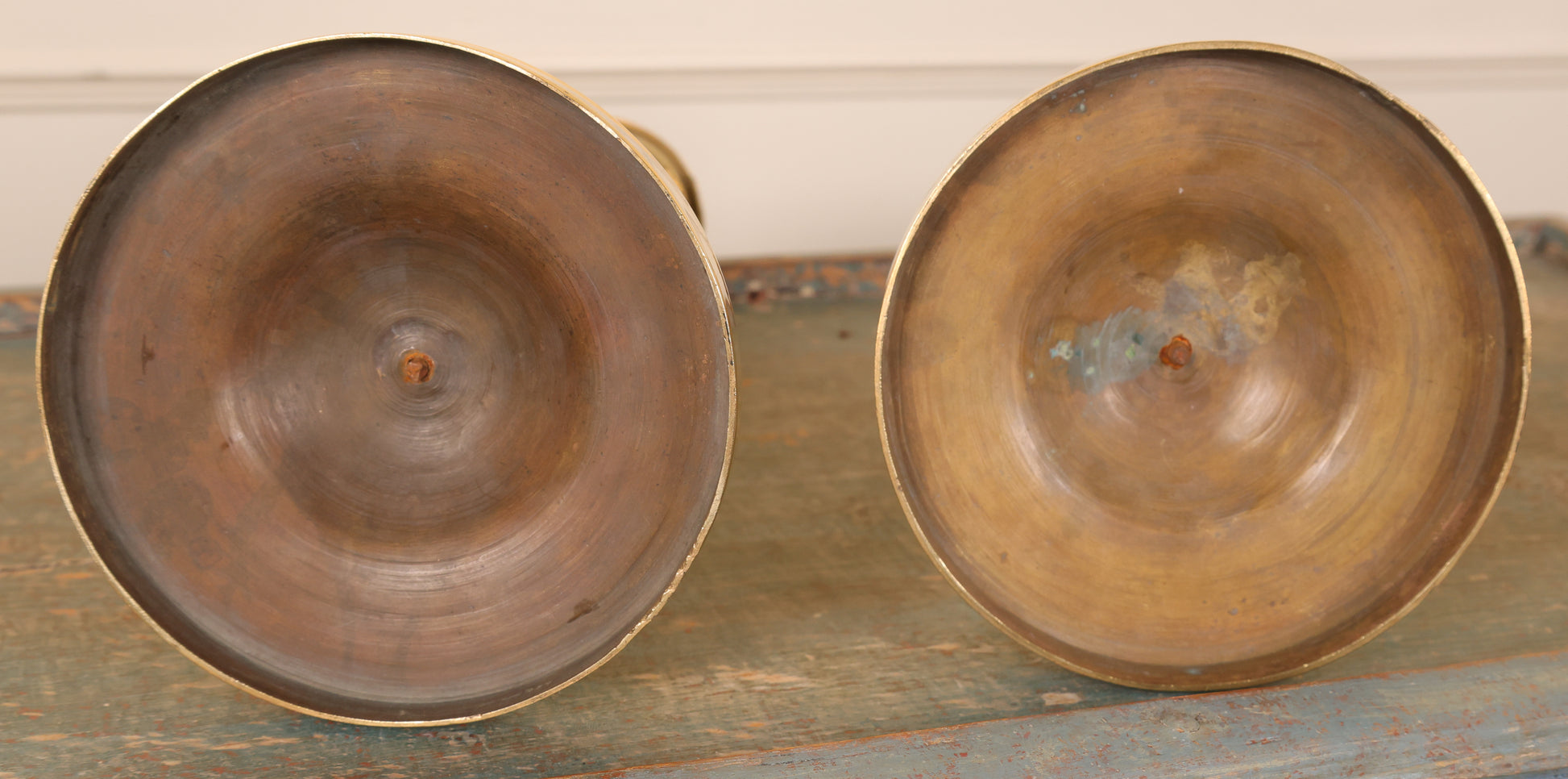 Pair of Empire Candlesticks underneath