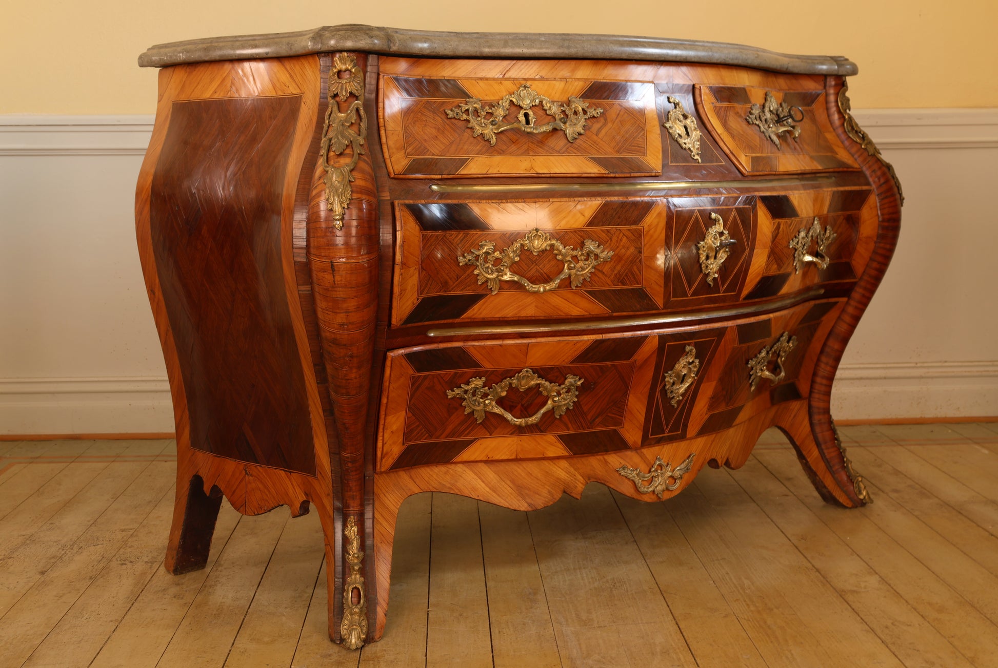 A Rococo dresser in jacaranda for sale.