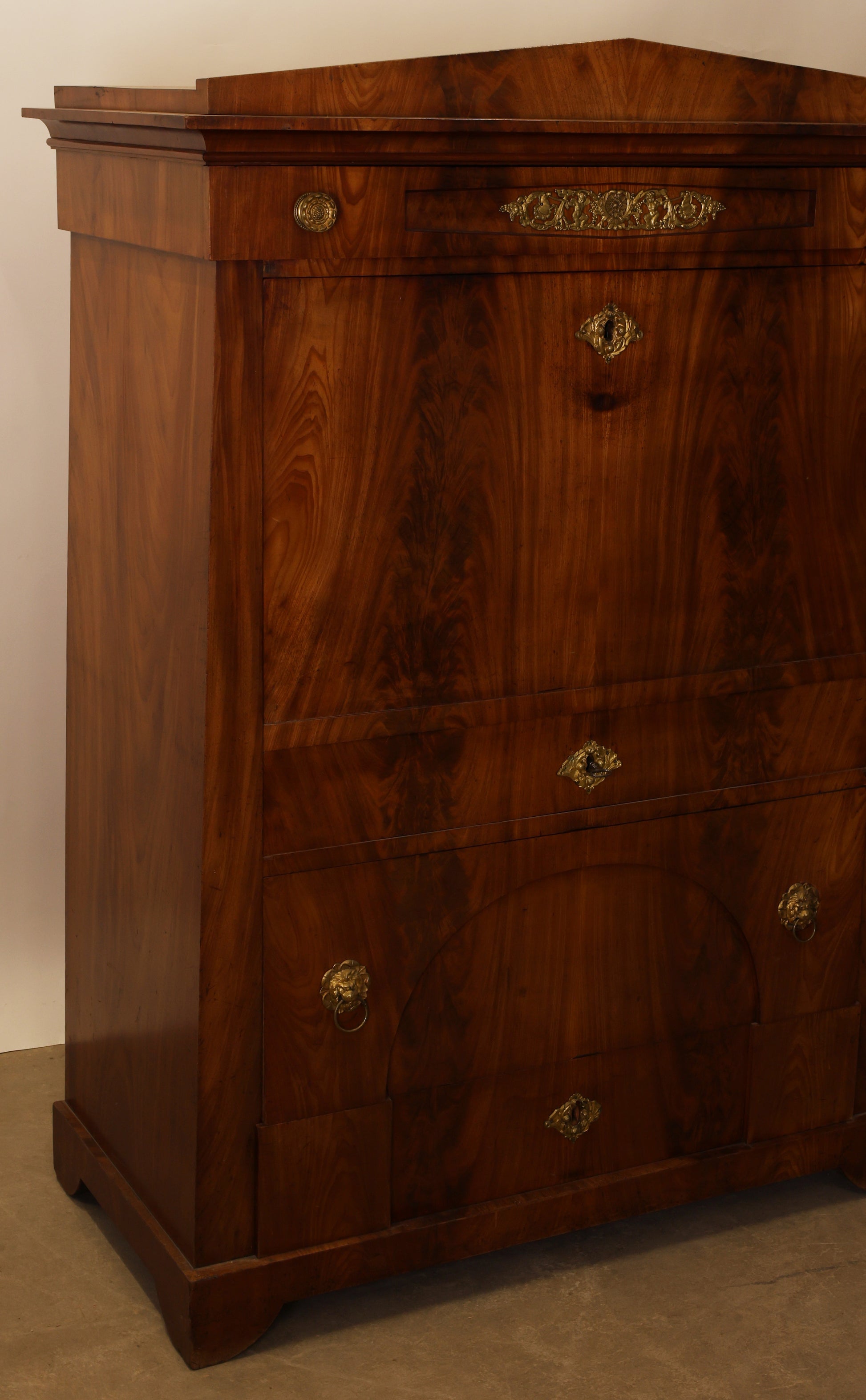 Empire furniture with gilded details.