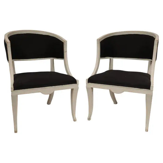 Pair of grey Empire Armchairs with black fabric and flared legs.