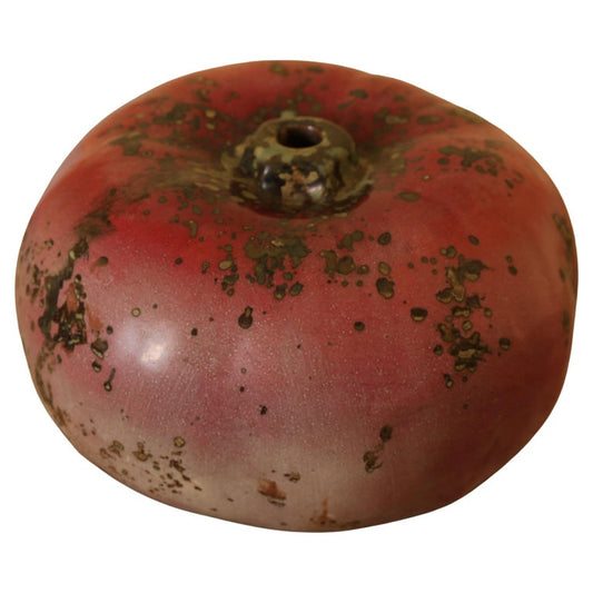 Red high-fired faience pumpkin by Hans Hedberg with white background